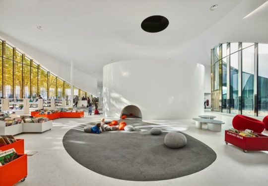 Thionville Library, France - I especially love that many of the book carts/shelves are on casters so you can roll them around!